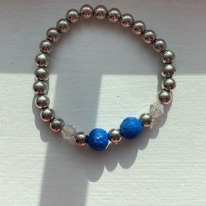 Call lava rock look in bead bracelet most likely made out of clay